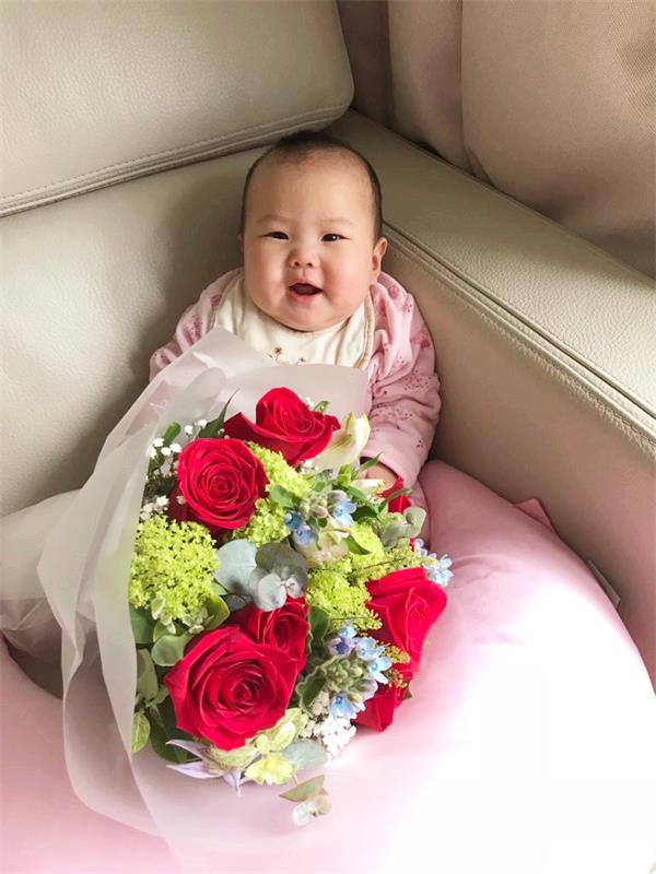 Babies And Flower Bouquets